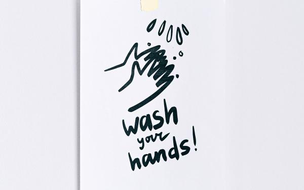 Drawing of hands being washed with text "Wash your Hands!"