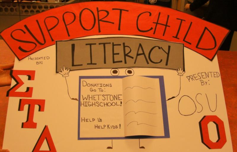 Poster reading "support child literacy"