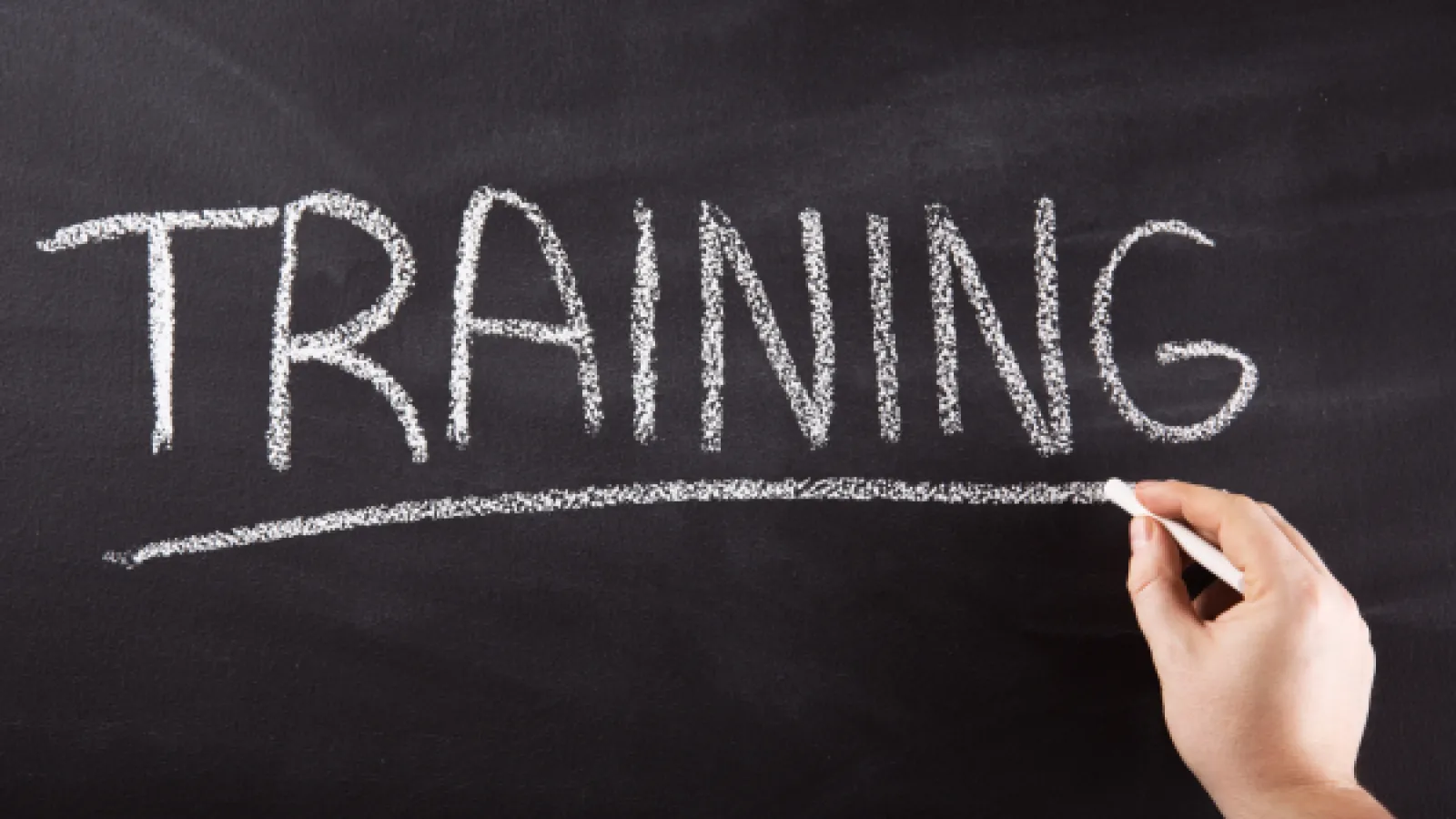 Chalkboard with "Training" written on it