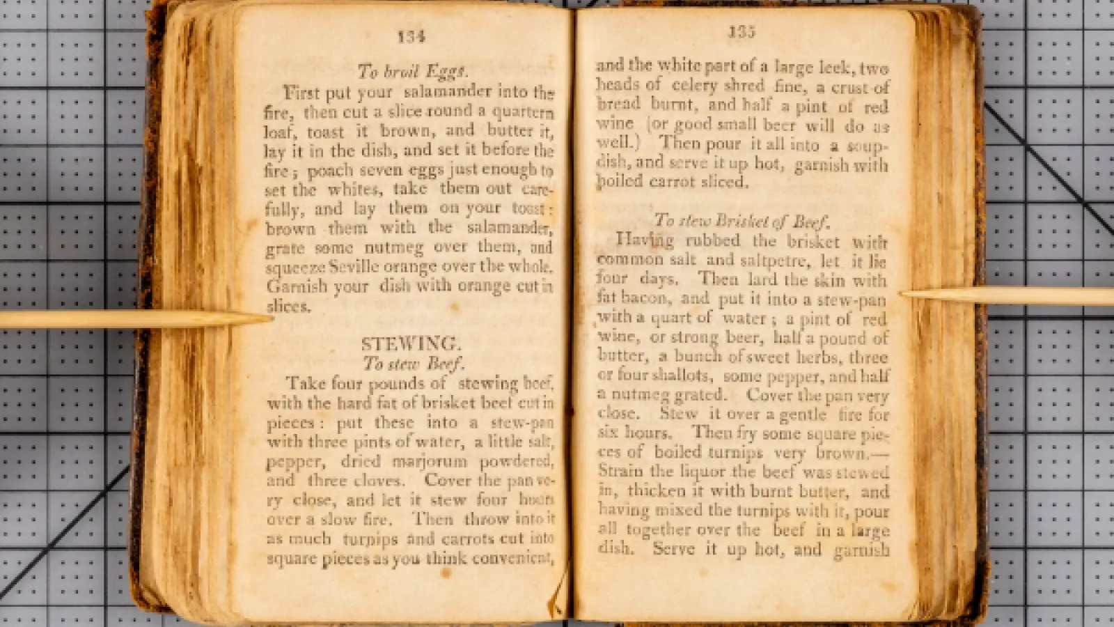 An open copy of the New American Cookery Cookbook 