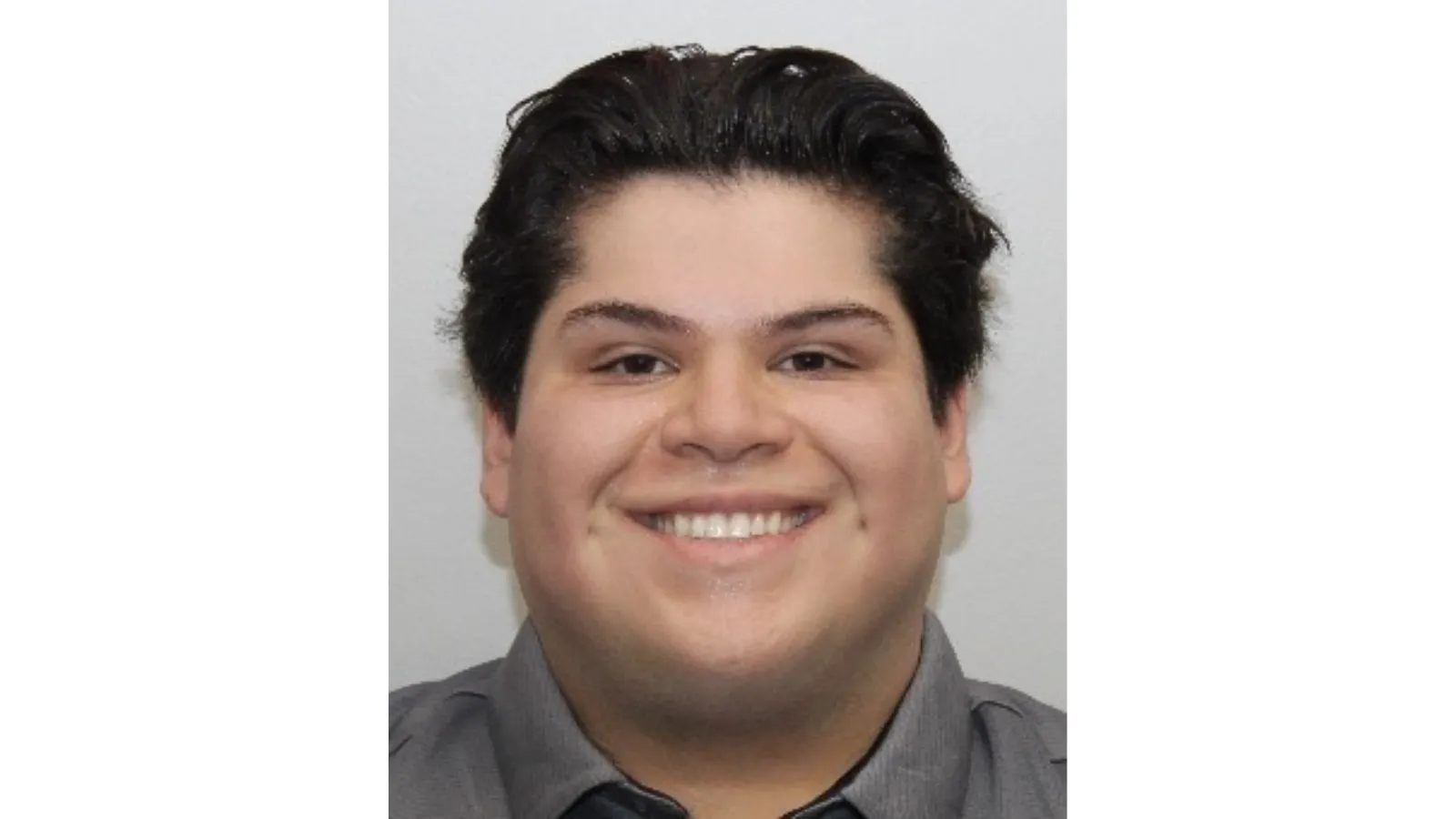 Professional headshot of Adrian Salgado