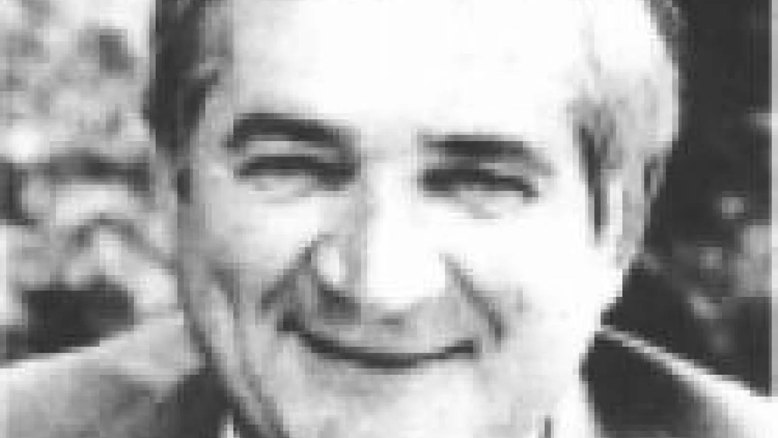 Albert J. Kuhn headshot in black and white
