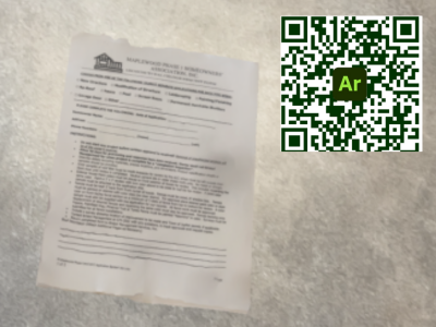 A 3D model of a home owners association contract sitting on a table, as seen on a mobile device.