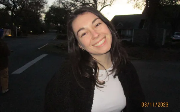Maggie Lardie posing outside