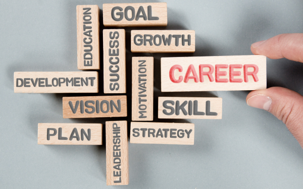 blocks reading "career" "goal" "growth" "skill" "vision" "plan" arranged together