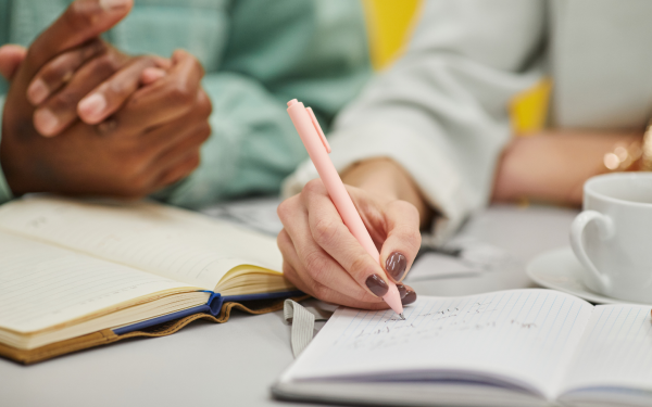 Hand writing in a notebook