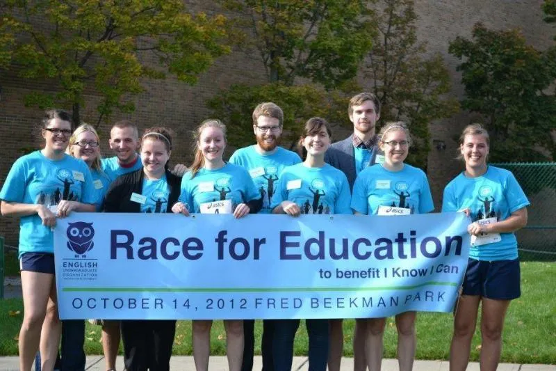 Race for Education participants with a banner.
