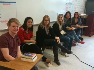 Sigma Tau Delta members sitting in a group
