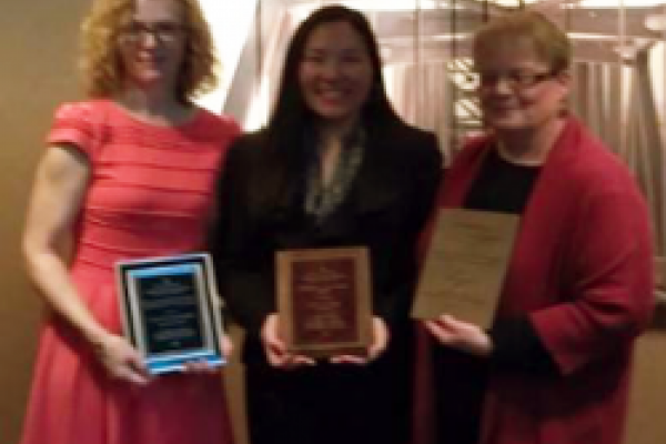 Renker, Itagaki and Johnson with their awards Photo of Renker, Itagaki and Johnson with their awards
