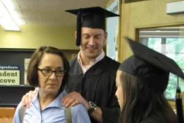 Brenda Brueggemann with graduates