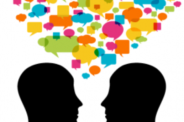 Silhouette of two heads facing each other, a cloud of word bubble forming above them