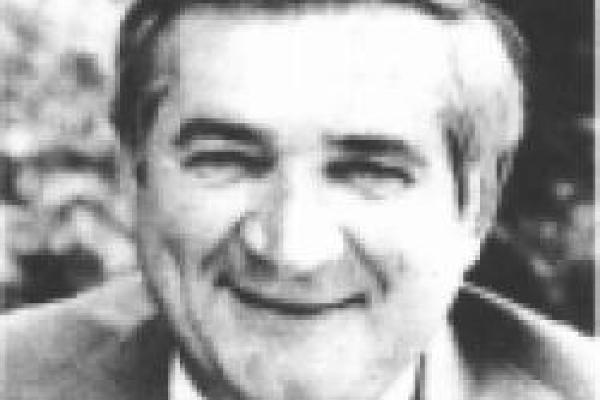 Albert J. Kuhn headshot in black and white