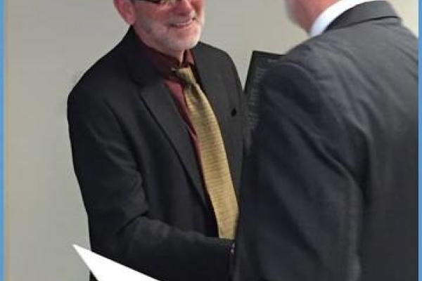 Brian McHale receiving an award