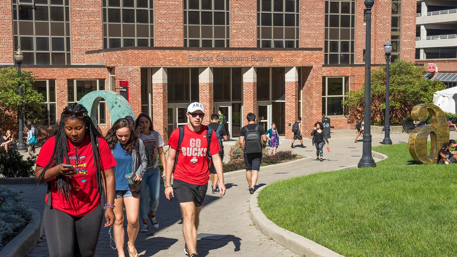 Students walking in front of Enarson Classroom Building